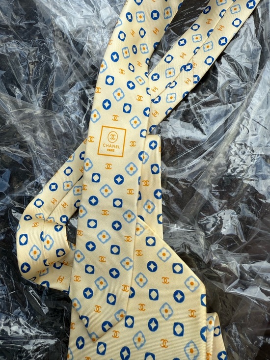 CHANEL Other - CHANEL Cream Tie with Blue and Gold Geometric Motif